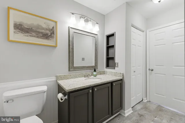 a view of hallway with windows and entryway