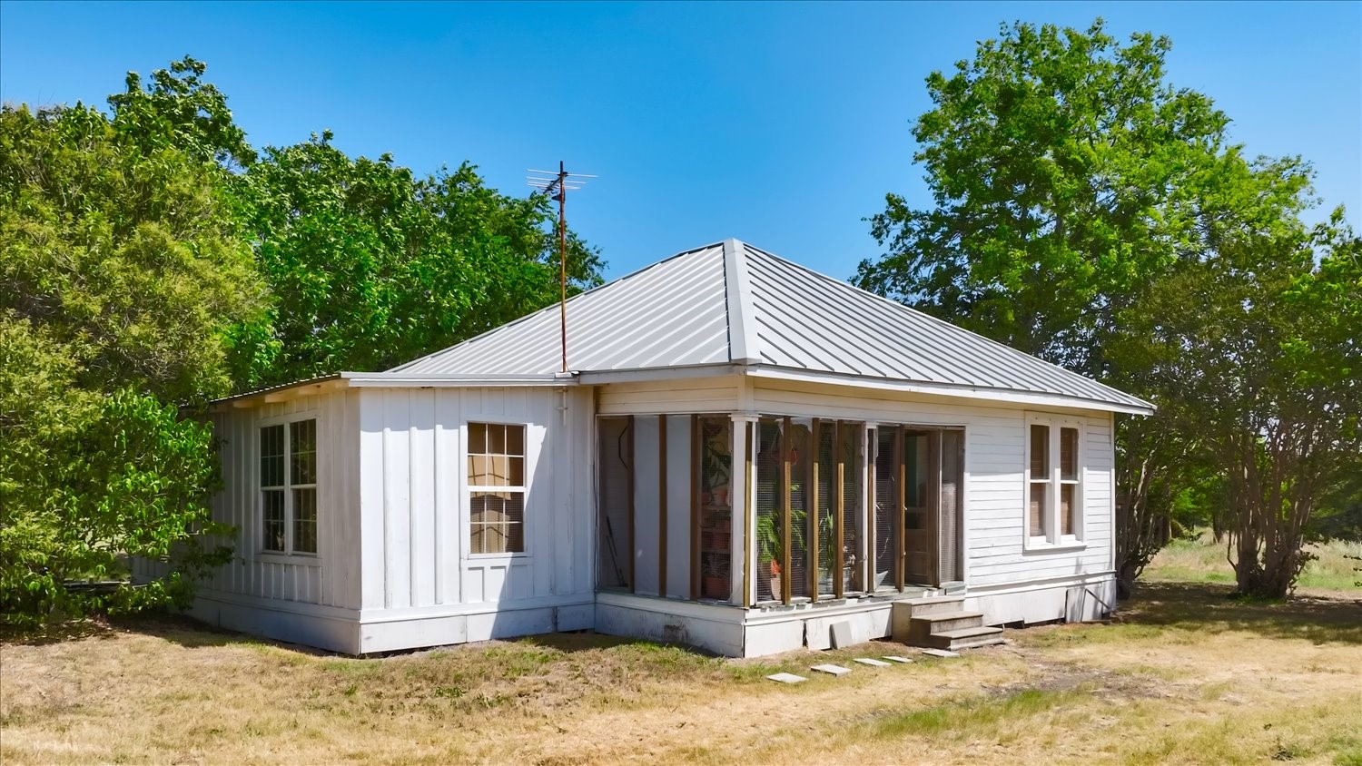 15000 Maha Road Austin, TX 78719 - Photo 16 of 16 a front view of a house with a yard