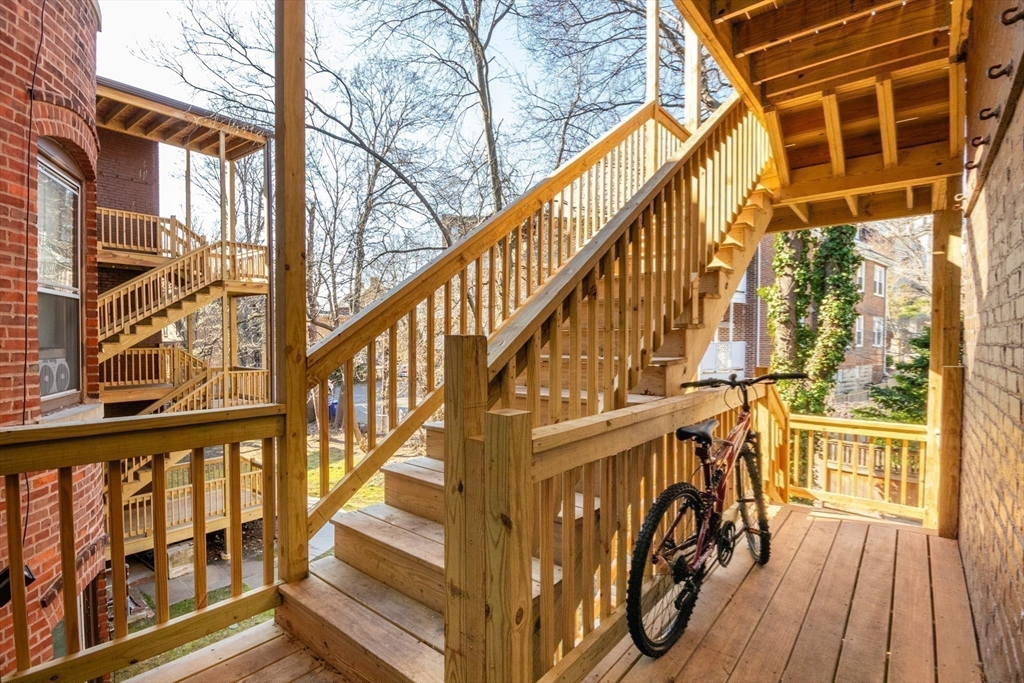 36 Winchester Street, Unit 6 Brookline, MA 02446 - Photo 16 of 20 a view of entryway with wooden floor and a front door