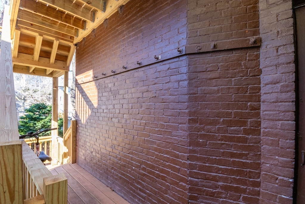 36 Winchester Street, Unit 6 Brookline, MA 02446 - Photo 18 of 20 a brick building with a window