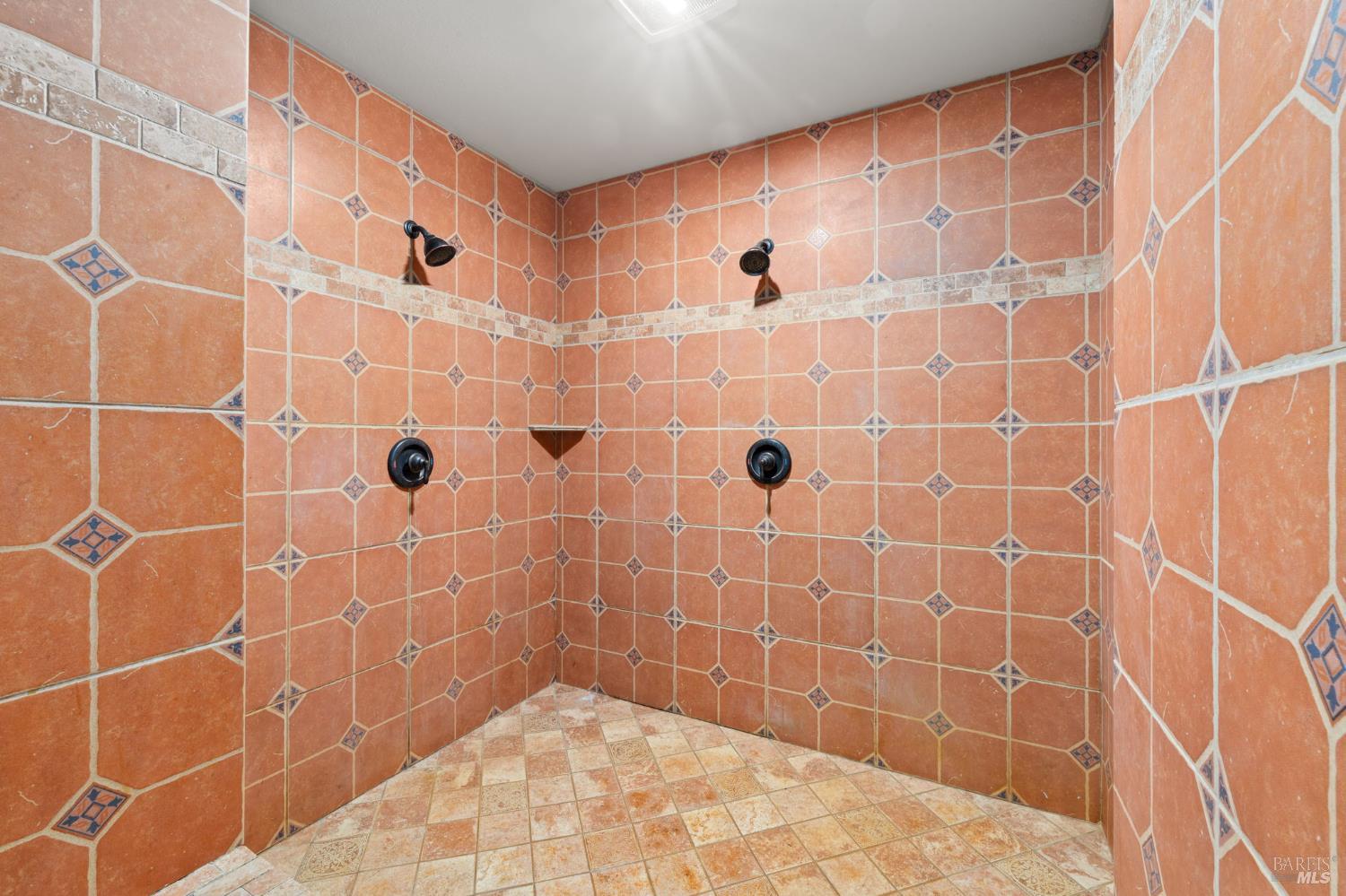 9935 Occidental Road Sebastopol, CA 95472 - Photo 26 of 59 Beautifully tiled primary shower, with dual shower heads