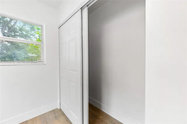 a view of a small space with a window