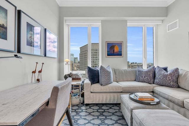 a living room with furniture and a couch