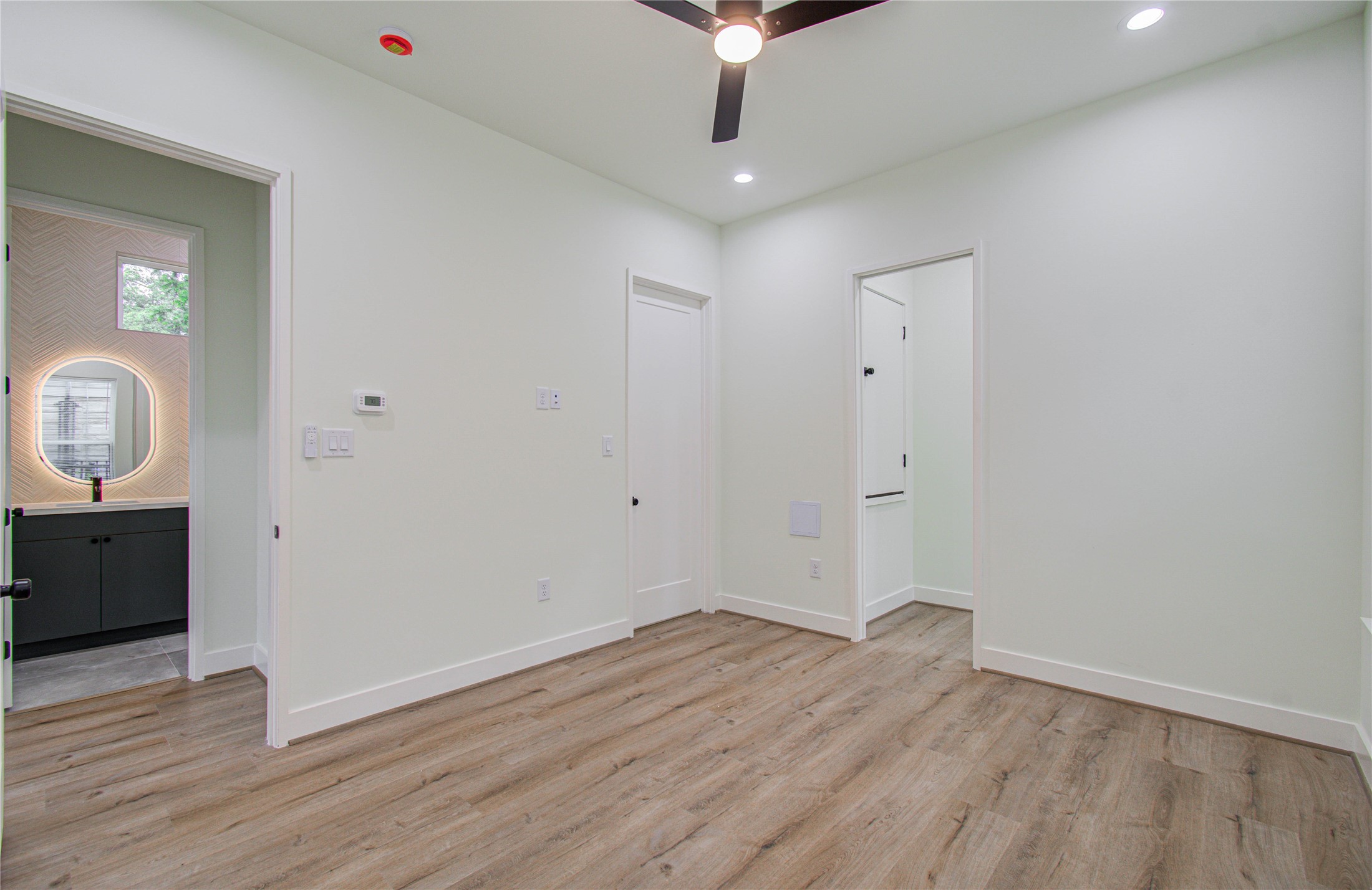 4603 Edison Street, Unit A Houston, TX 77009 - Photo 13 of 23 a view of a room with wooden floor