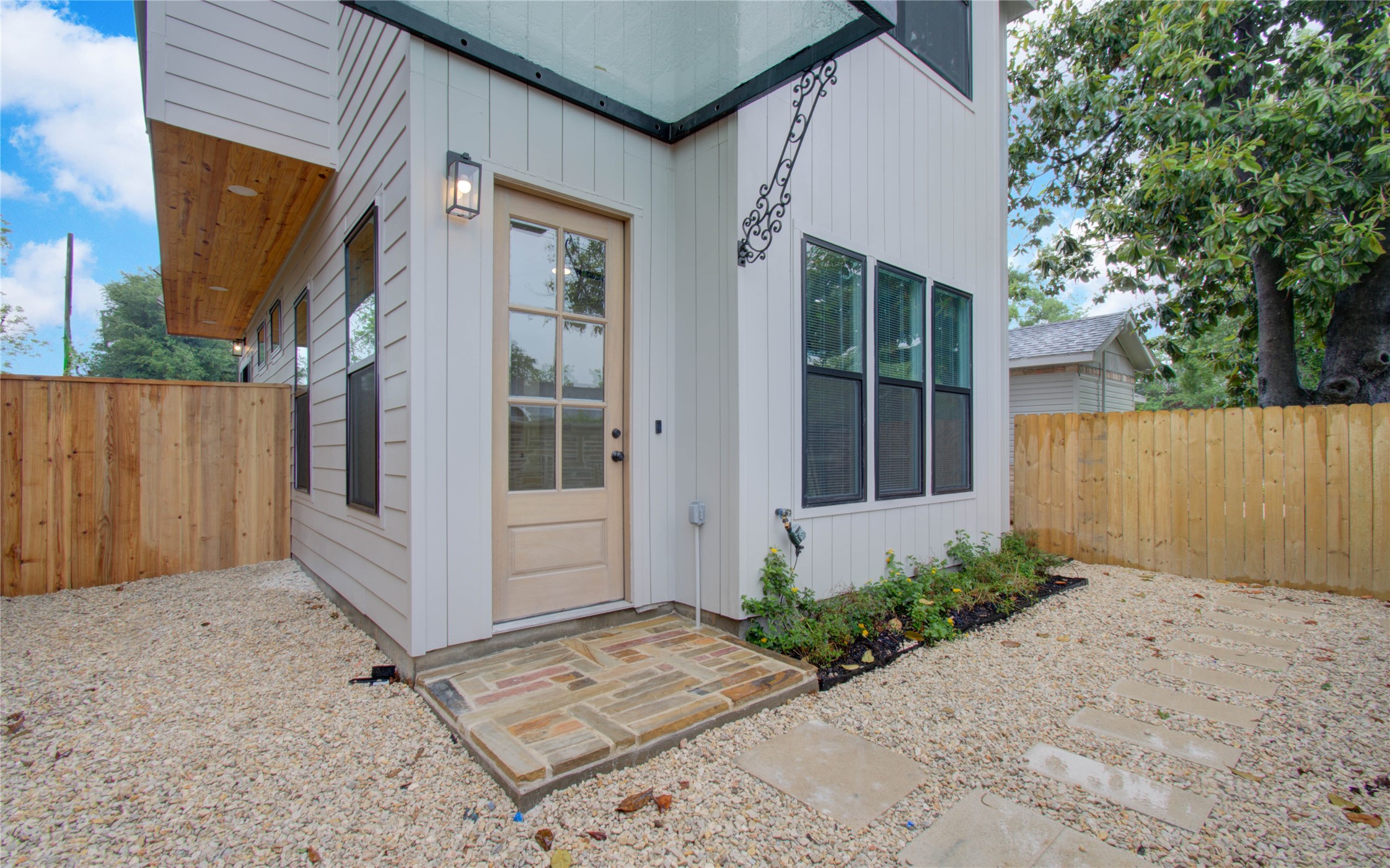 4603 Edison Street, Unit A Houston, TX 77009 - Photo 2 of 23 a view of a house with backyard and garden
