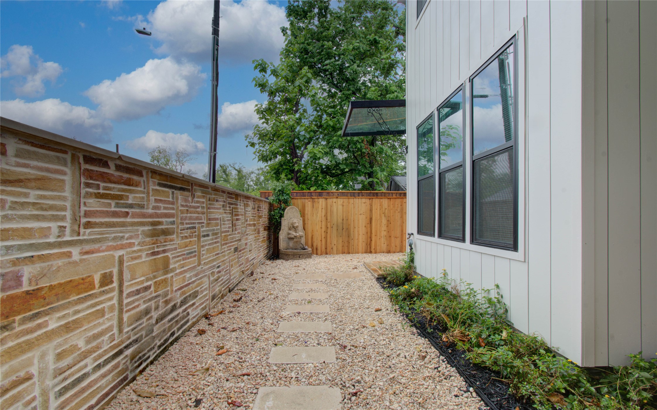 4603 Edison Street, Unit A Houston, TX 77009 - Photo 23 of 23 a backyard of a house with lots of green space