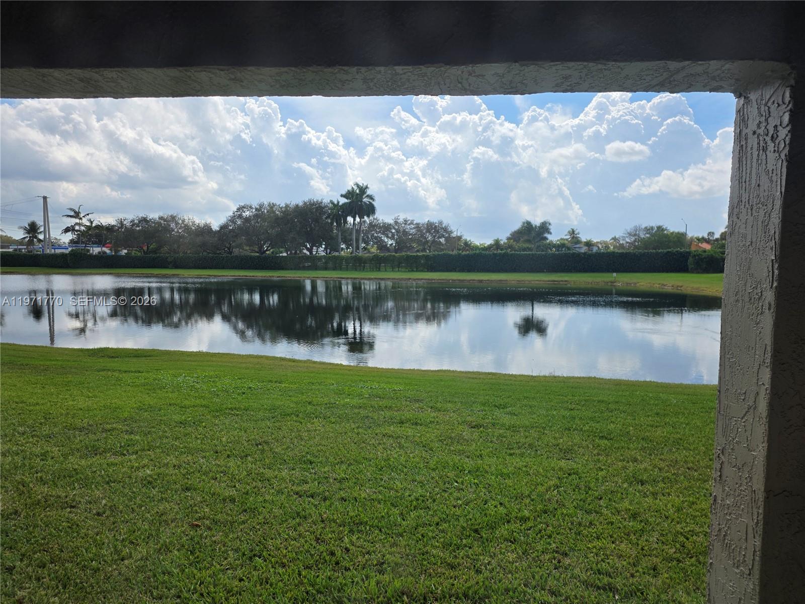 12490 Southwest 54th Street, Unit 12490 Miramar, FL 33027 - Photo 3 of 7 a view of a lake