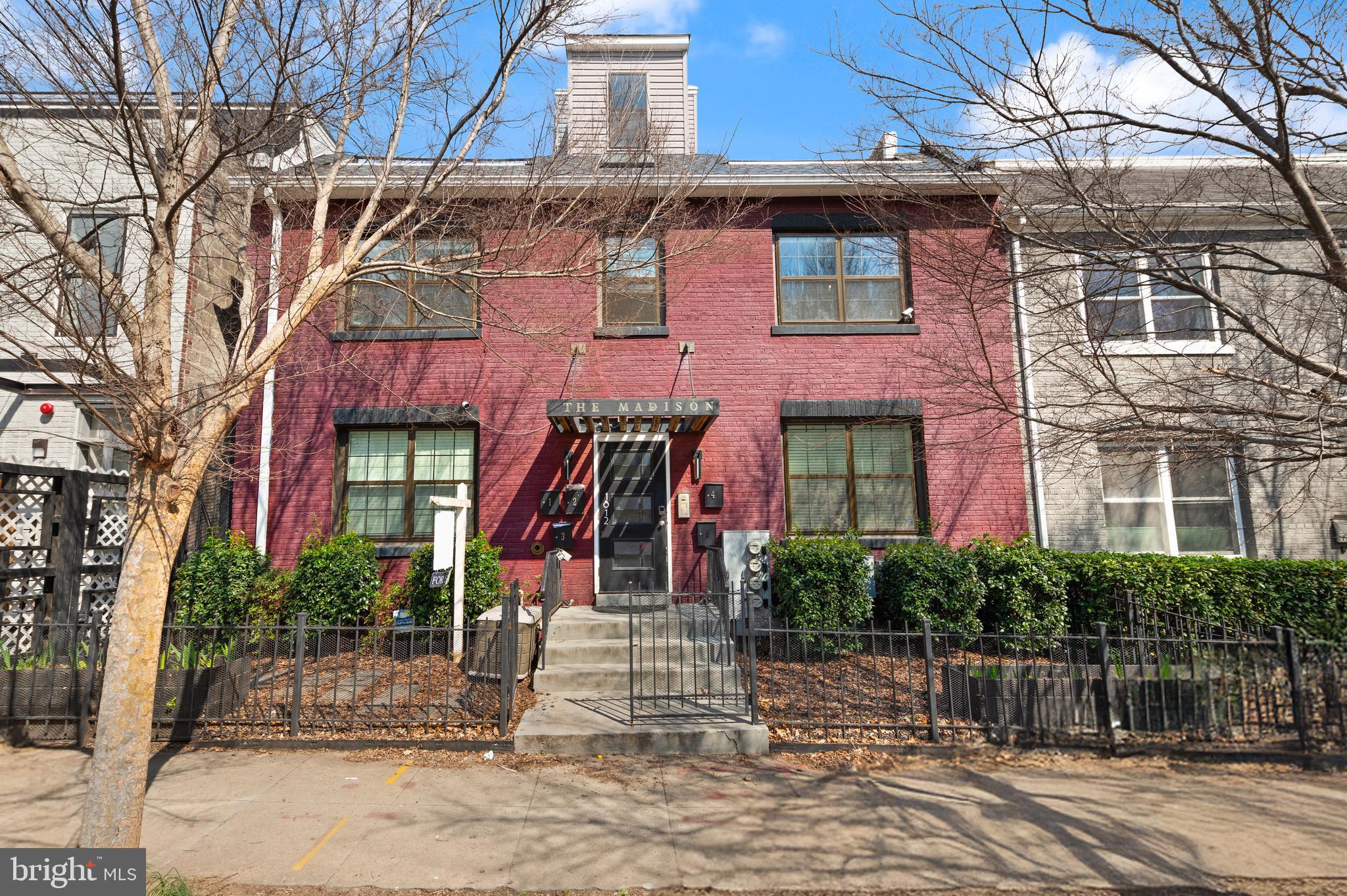 a front view of a multi story residential apartment building