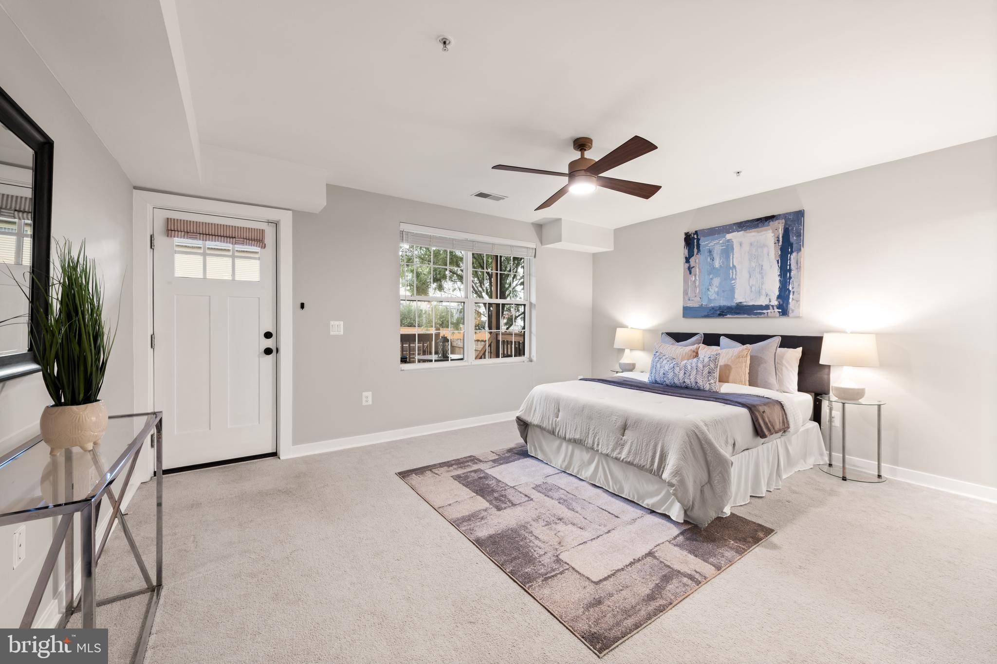 1812 D Street Northeast, Unit 1 Washington, DC 20002 - Photo 13 of 31 a bedroom with bed and window
