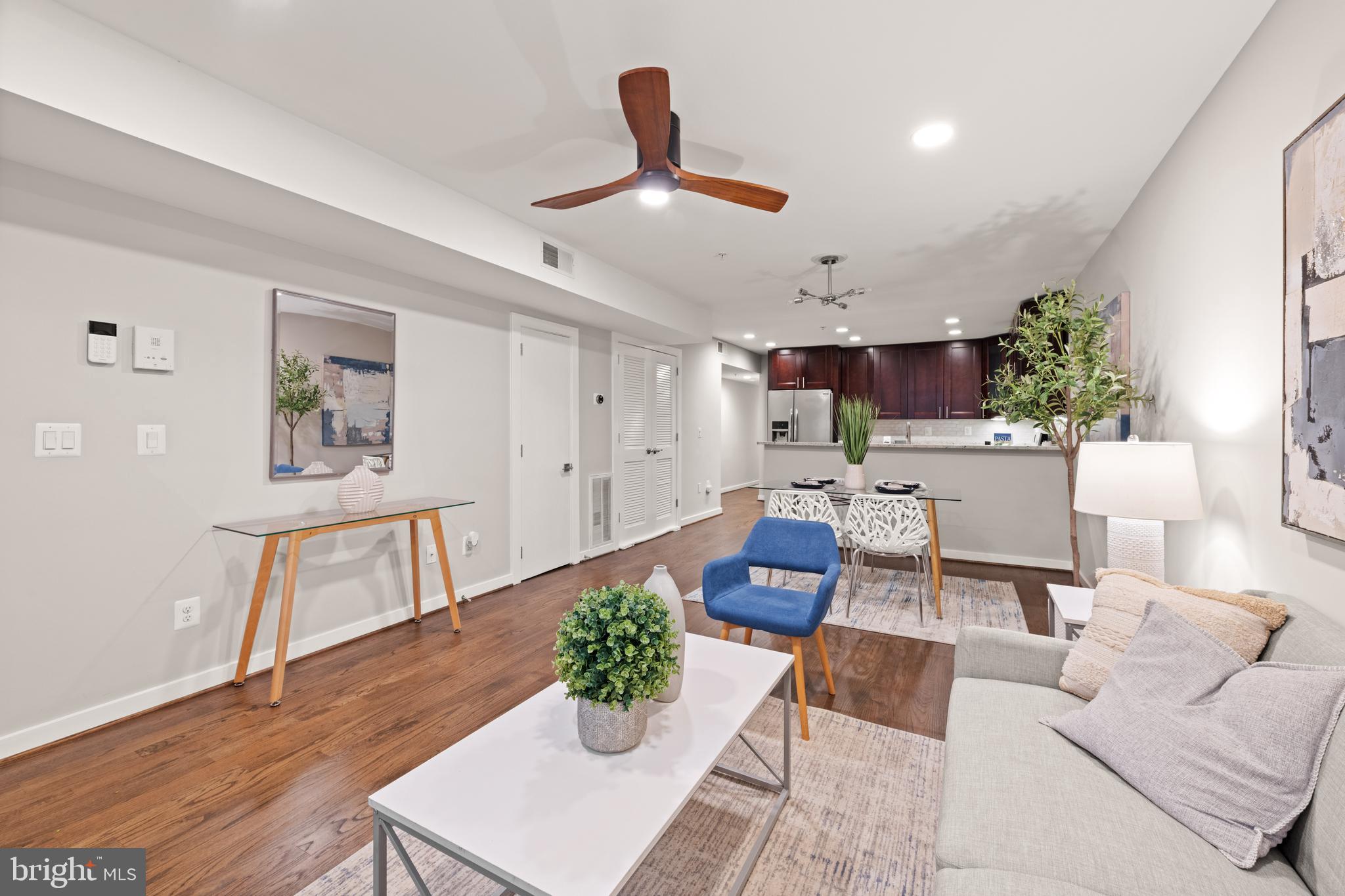 1812 D Street Northeast, Unit 1 Washington, DC 20002 - Photo 6 of 31 a living room with furniture and a wooden floor