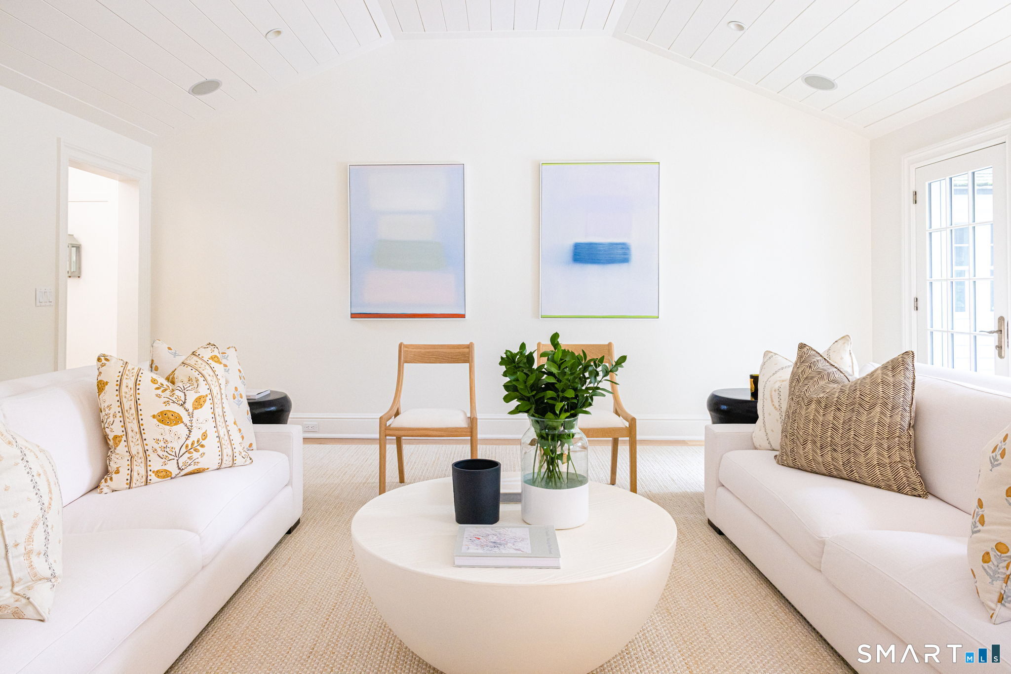 90 5 Mile River Road Darien, CT 06820 - Photo 14 of 35 a living room with furniture and a potted plant