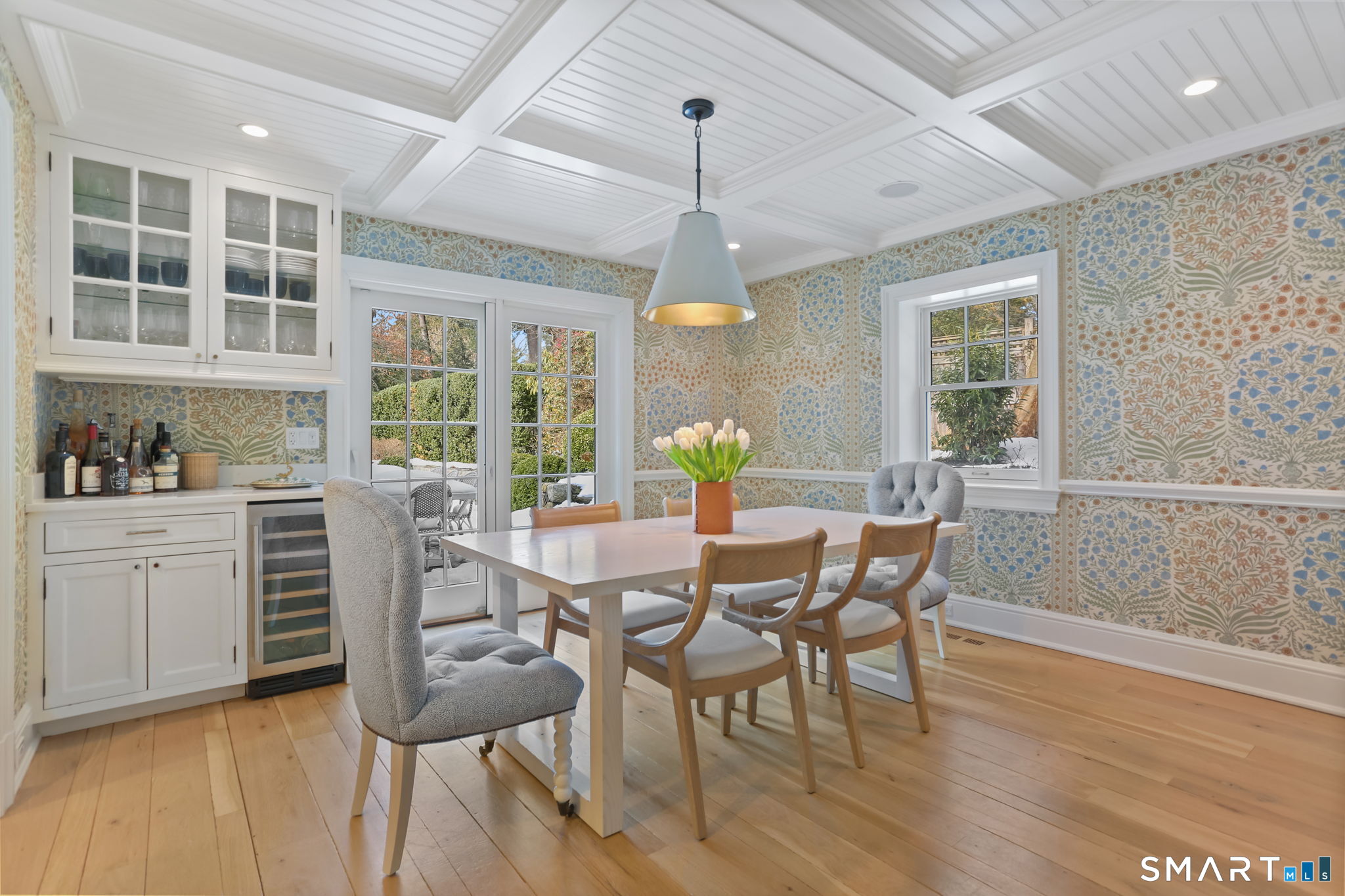 90 5 Mile River Road Darien, CT 06820 - Photo 19 of 35 a view of a dining room with furniture windows and wooden floor