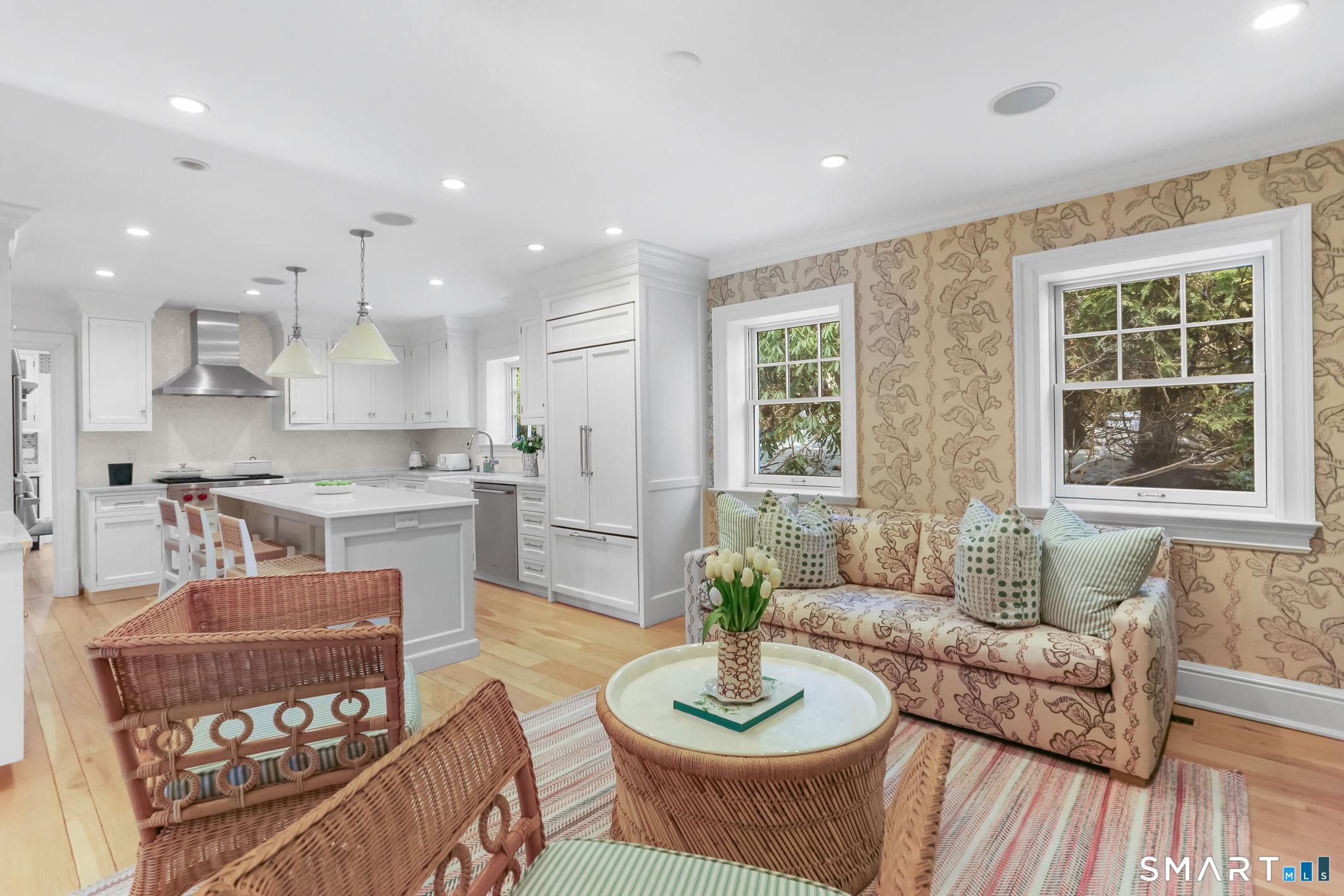 90 5 Mile River Road Darien, CT 06820 - Photo 22 of 35 a living room with furniture and kitchen view