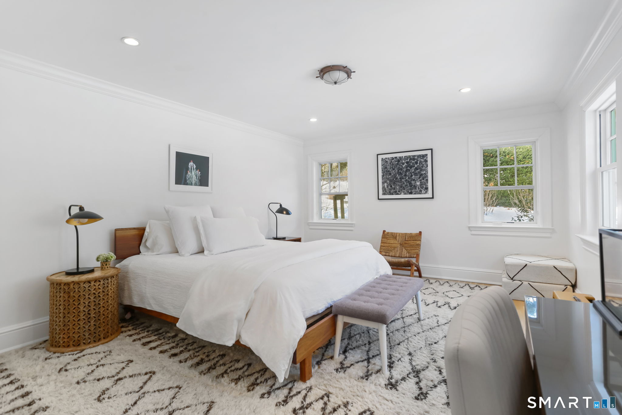 90 5 Mile River Road Darien, CT 06820 - Photo 29 of 35 a bedroom with double bed and a window