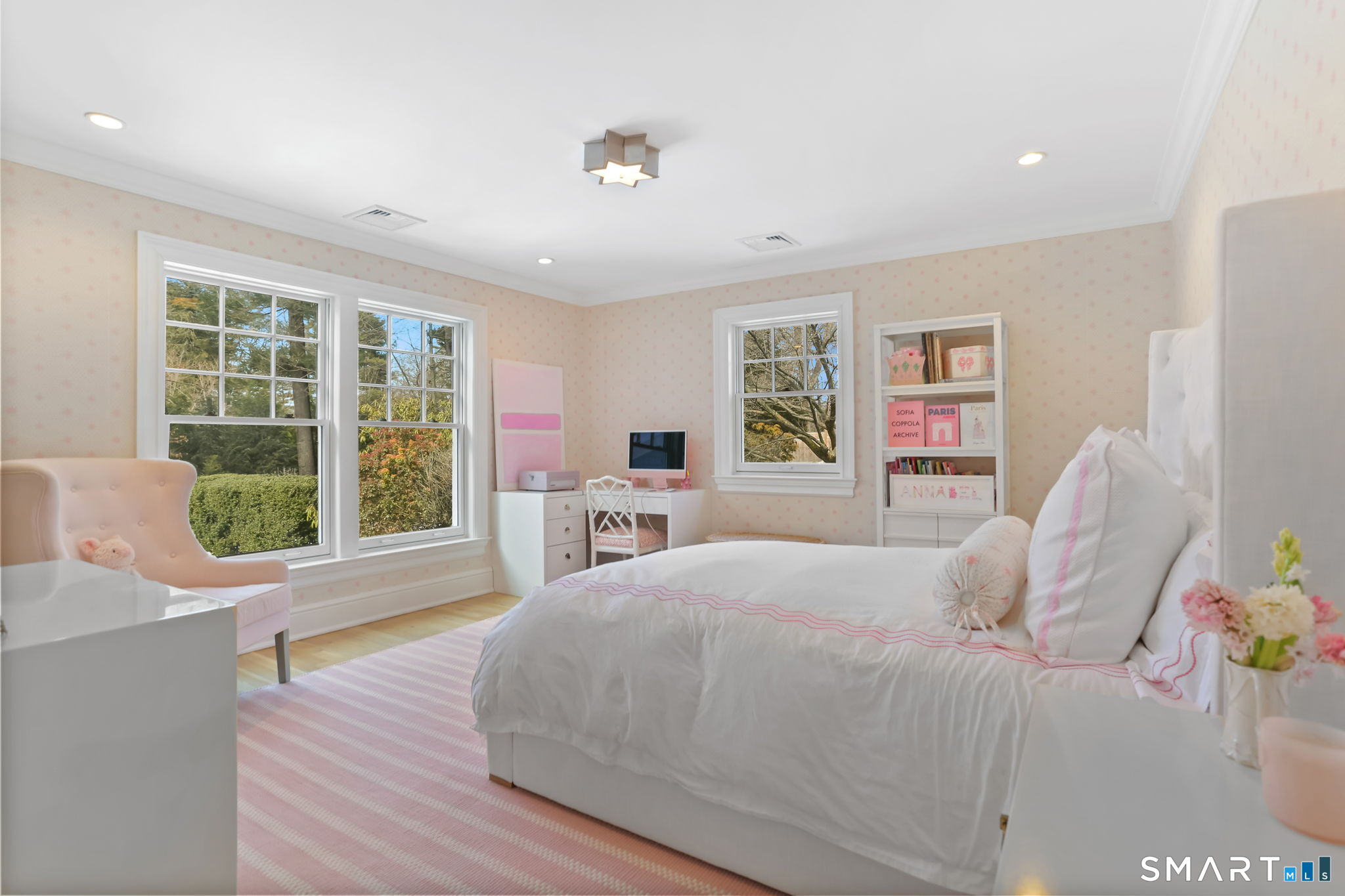 90 5 Mile River Road Darien, CT 06820 - Photo 30 of 35 a bedroom with a bed and a large window