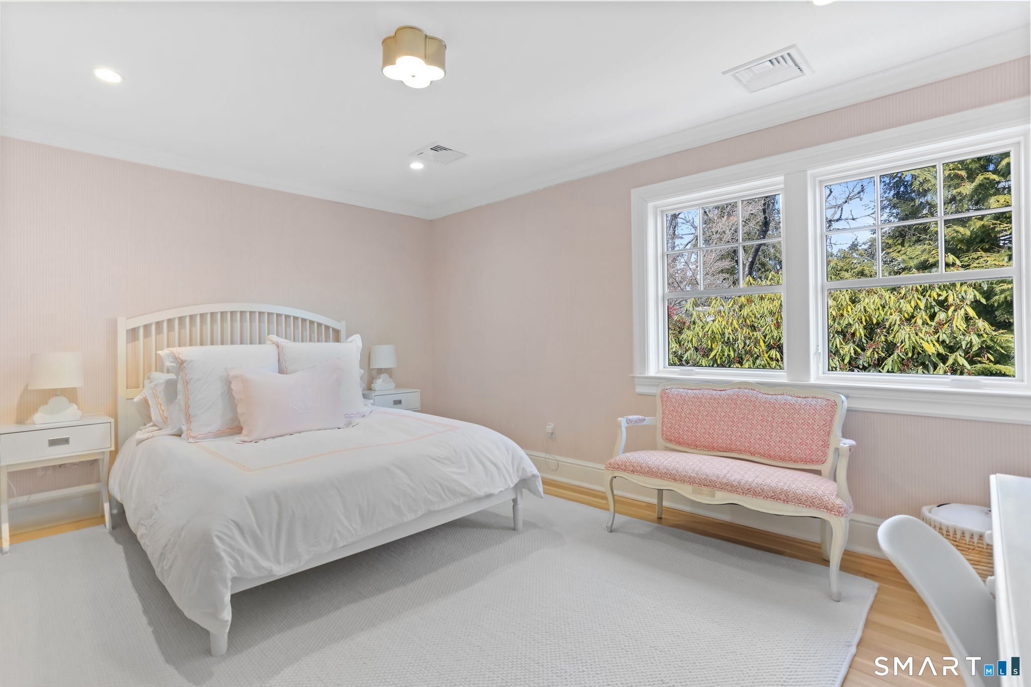 90 5 Mile River Road Darien, CT 06820 - Photo 31 of 35 a bedroom with a bed and a couch