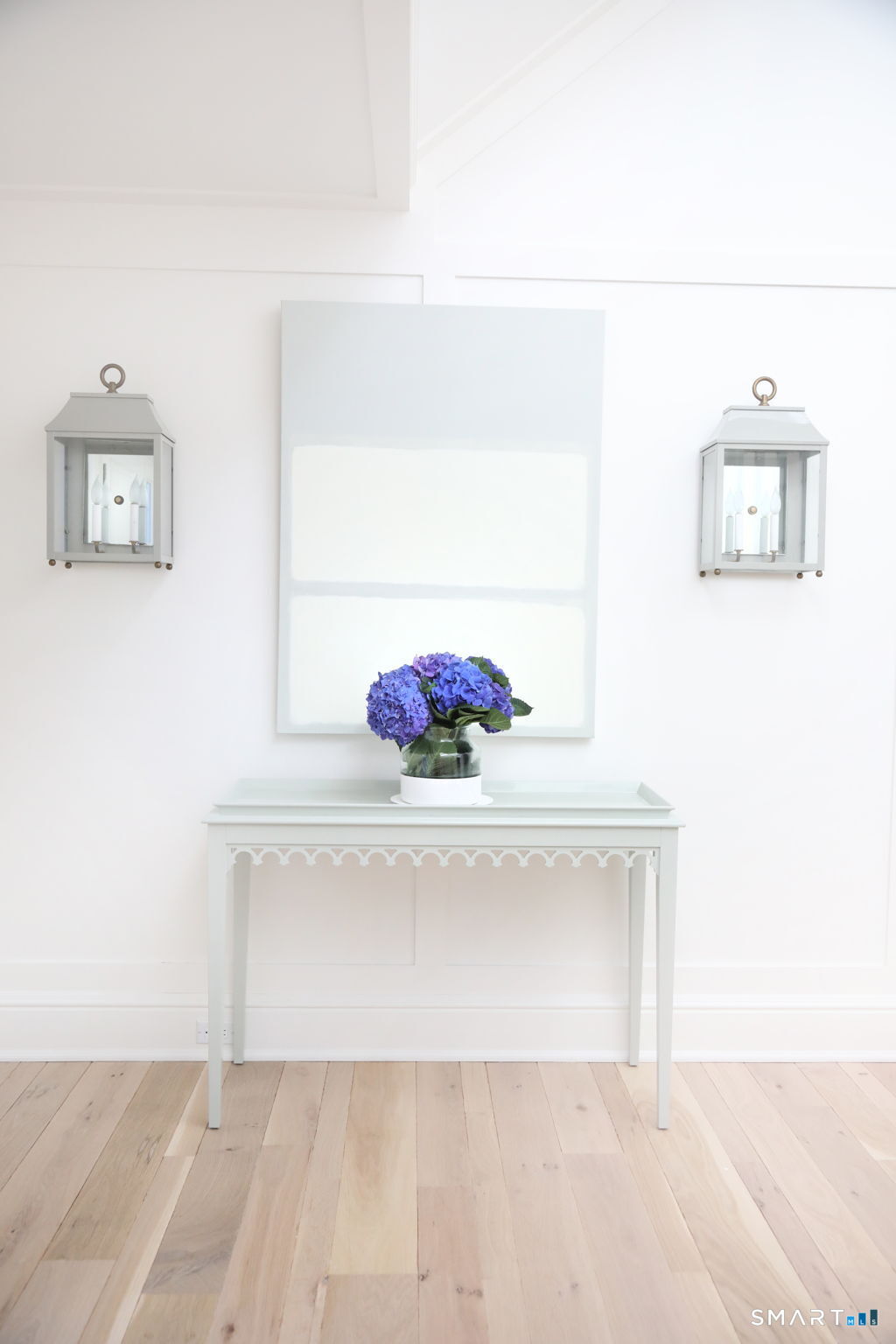 90 5 Mile River Road Darien, CT 06820 - Photo 5 of 35 a bathroom with a sink and a mirror