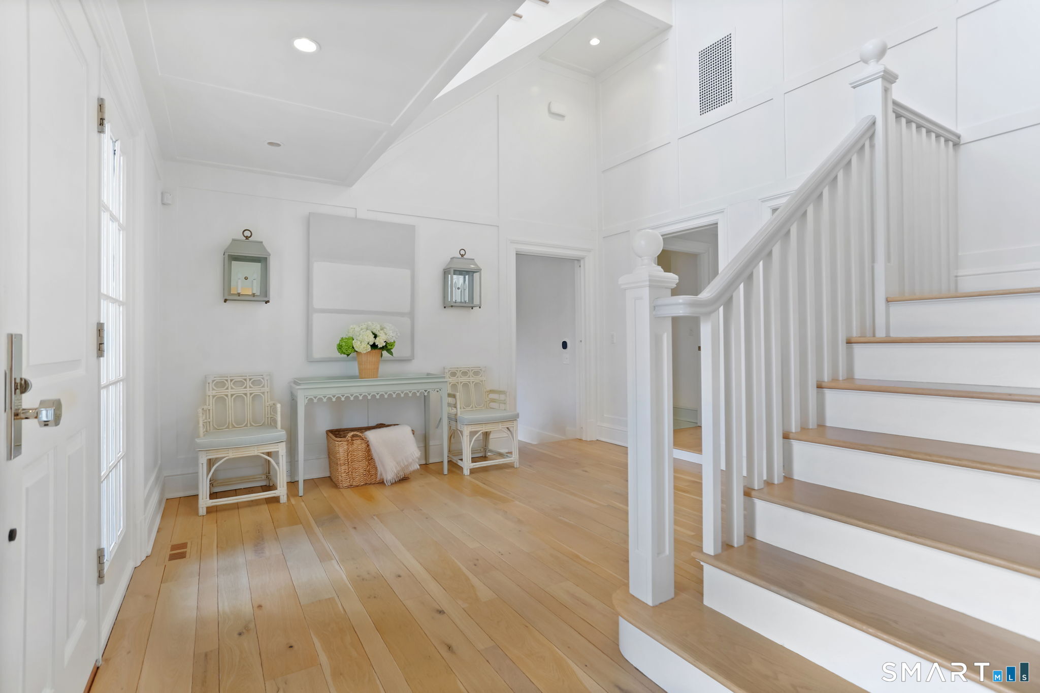 90 5 Mile River Road Darien, CT 06820 - Photo 6 of 35 a view of a livingroom with furniture and wooden floor