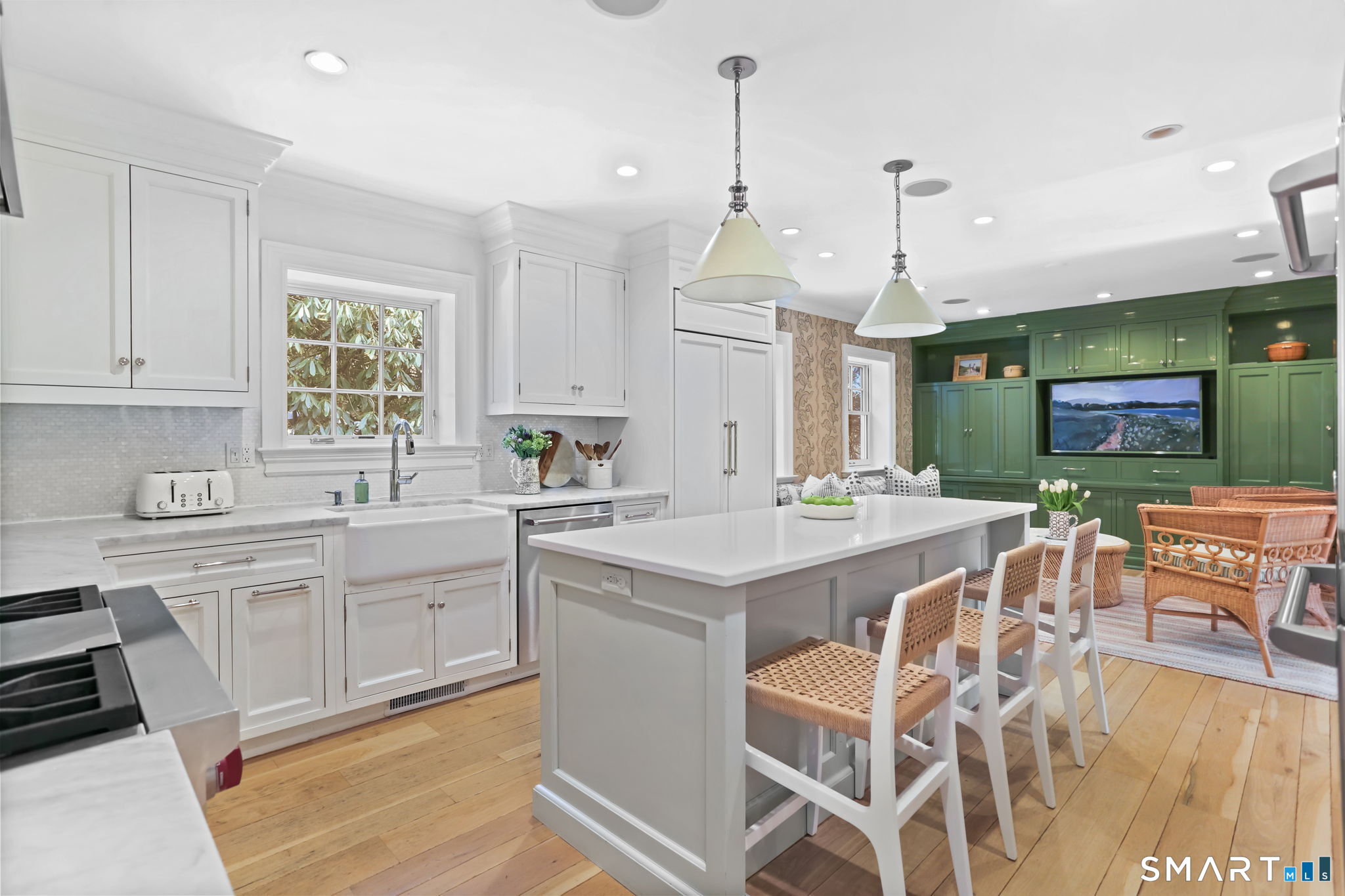 90 5 Mile River Road Darien, CT 06820 - Photo 8 of 35 a kitchen with granite countertop a sink appliances and cabinets