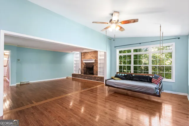 a kitchen with a sink stove and microwave