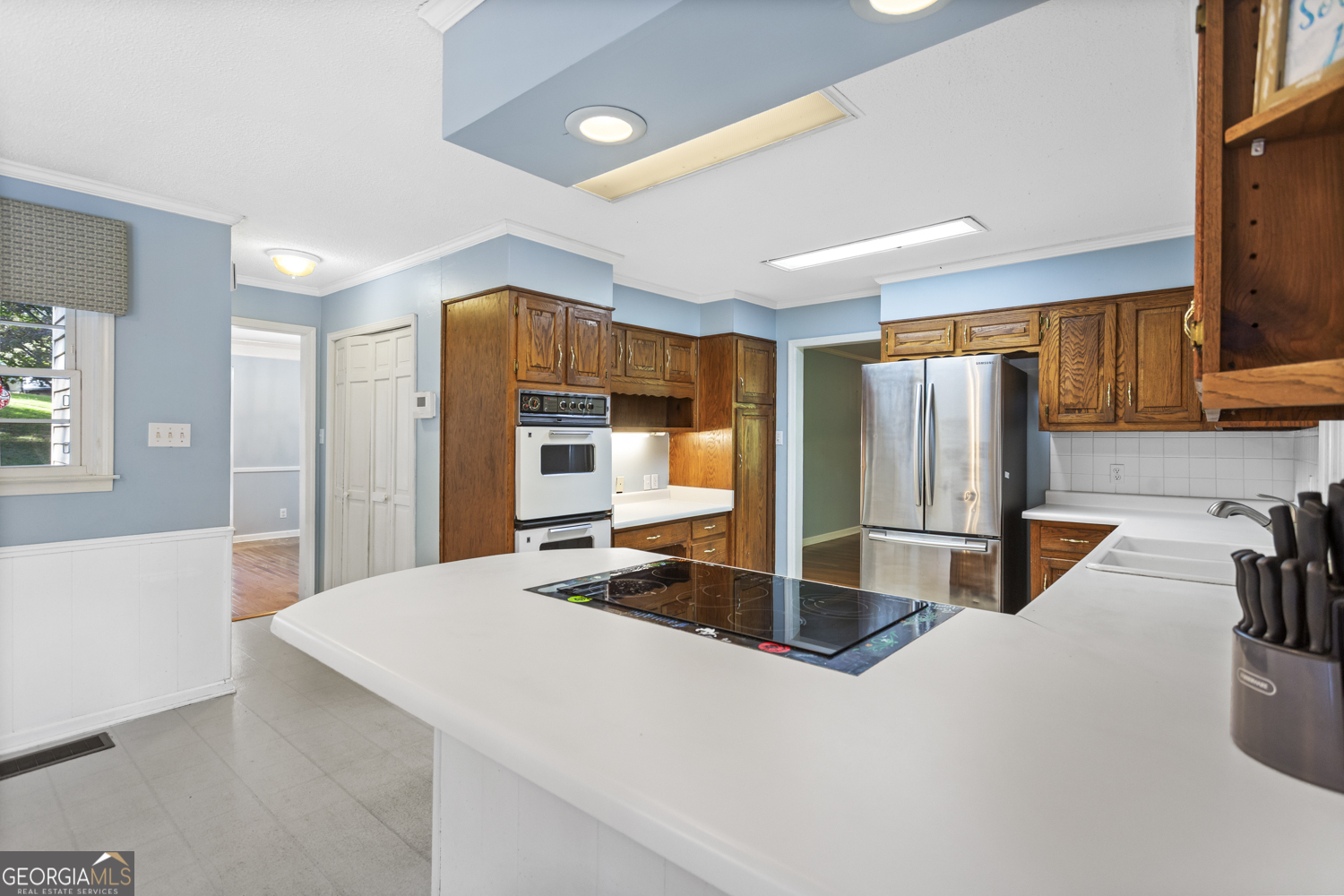 73 Ridgeview Heights Toccoa, GA 30577 - Photo 18 of 67 a kitchen with stainless steel appliances a refrigerator and a stove top oven