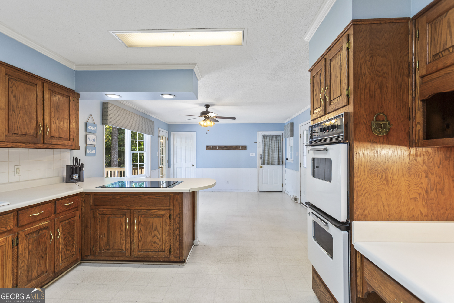 73 Ridgeview Heights Toccoa, GA 30577 - Photo 19 of 67 a kitchen with a sink stove and microwave