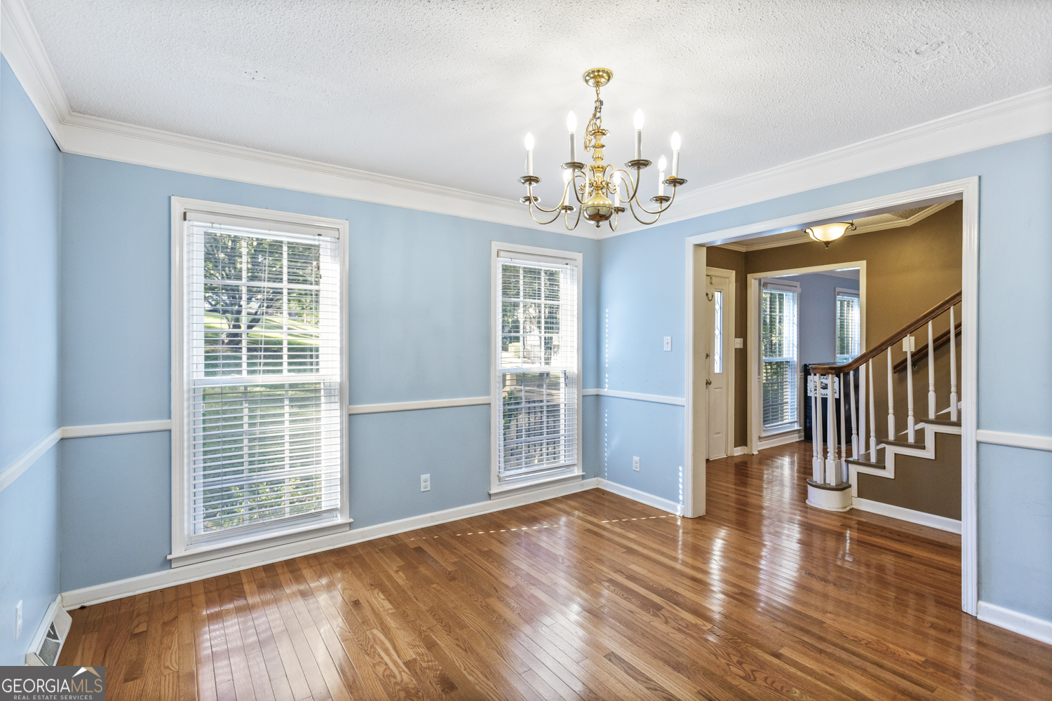 73 Ridgeview Heights Toccoa, GA 30577 - Photo 22 of 67 a view of an empty room with wooden floor and a window