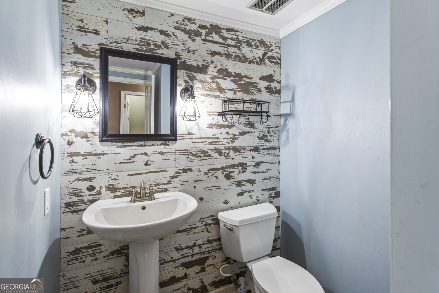 73 Ridgeview Heights Toccoa, GA 30577 - Photo 24 of 67 a bathroom with a sink a toilet and mirror