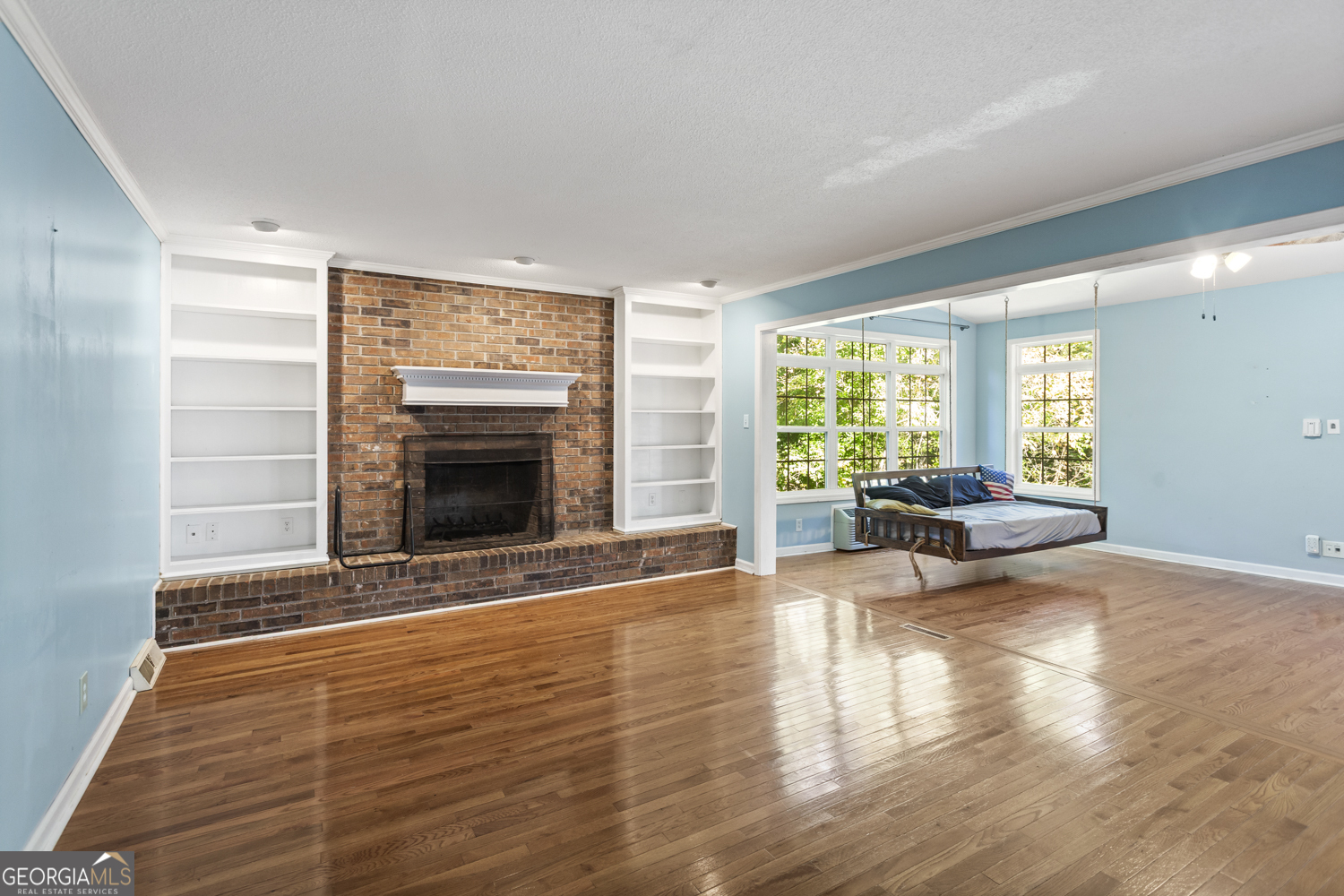 73 Ridgeview Heights Toccoa, GA 30577 - Photo 3 of 67 a view of a livingroom with wooden floor and a fireplace