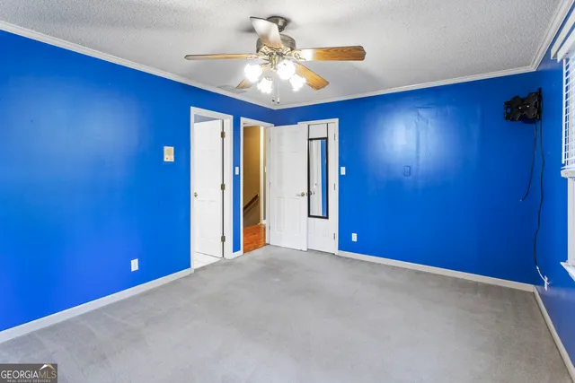 a bathroom with a double vanity sink mirror and shower