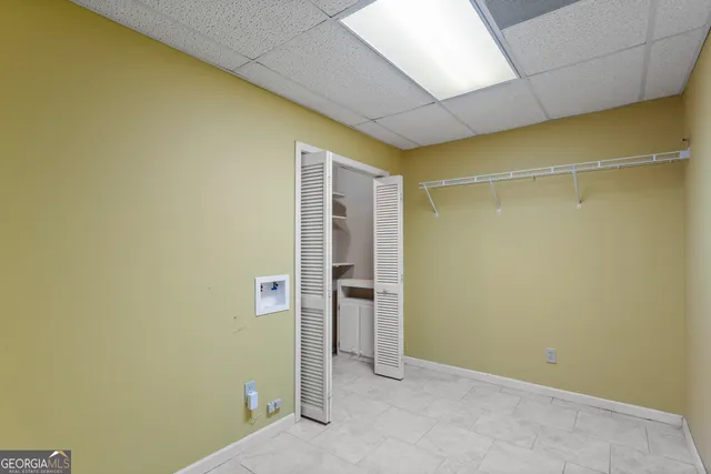 a view of wooden floor with a window