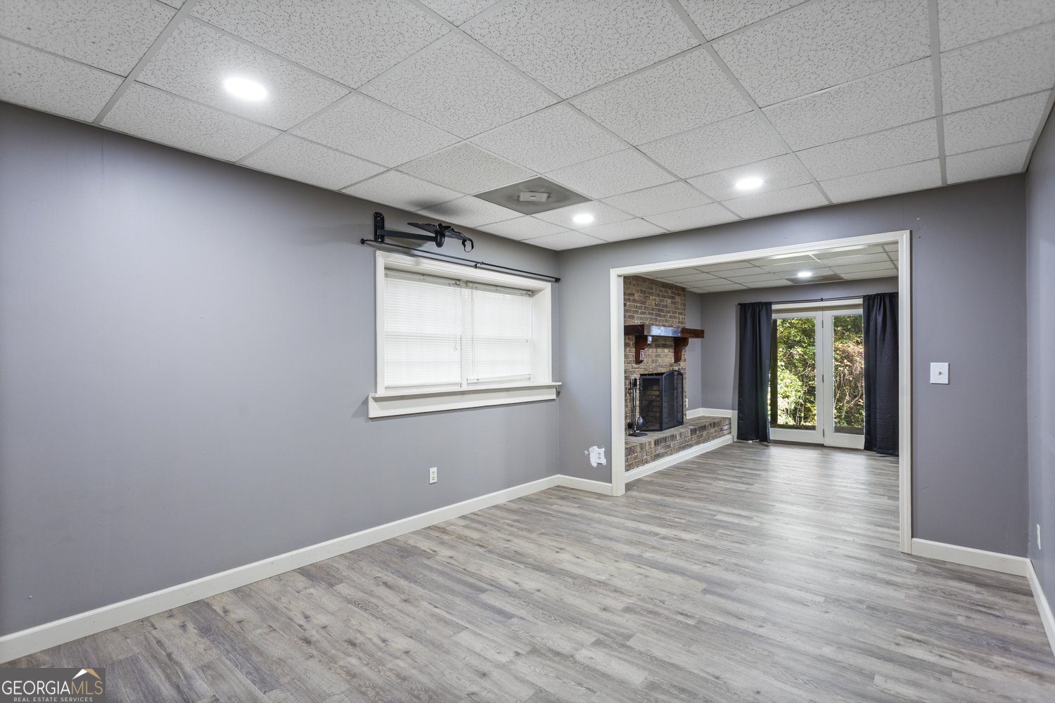 73 Ridgeview Heights Toccoa, GA 30577 - Photo 44 of 67 an empty room with wooden floor and windows