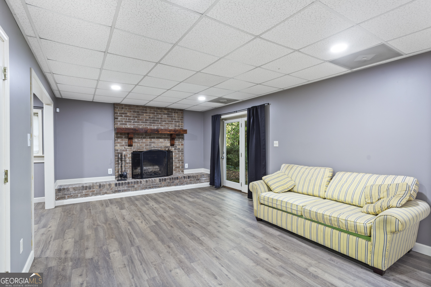 73 Ridgeview Heights Toccoa, GA 30577 - Photo 46 of 67 a living room with furniture and a fireplace