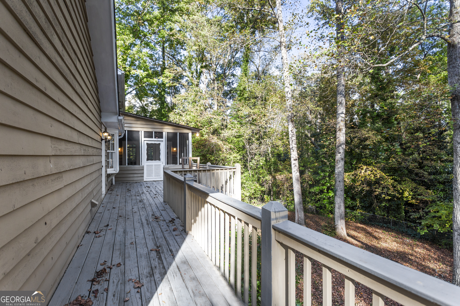 73 Ridgeview Heights Toccoa, GA 30577 - Photo 52 of 67 a view of a balcony with wooden floor and fence