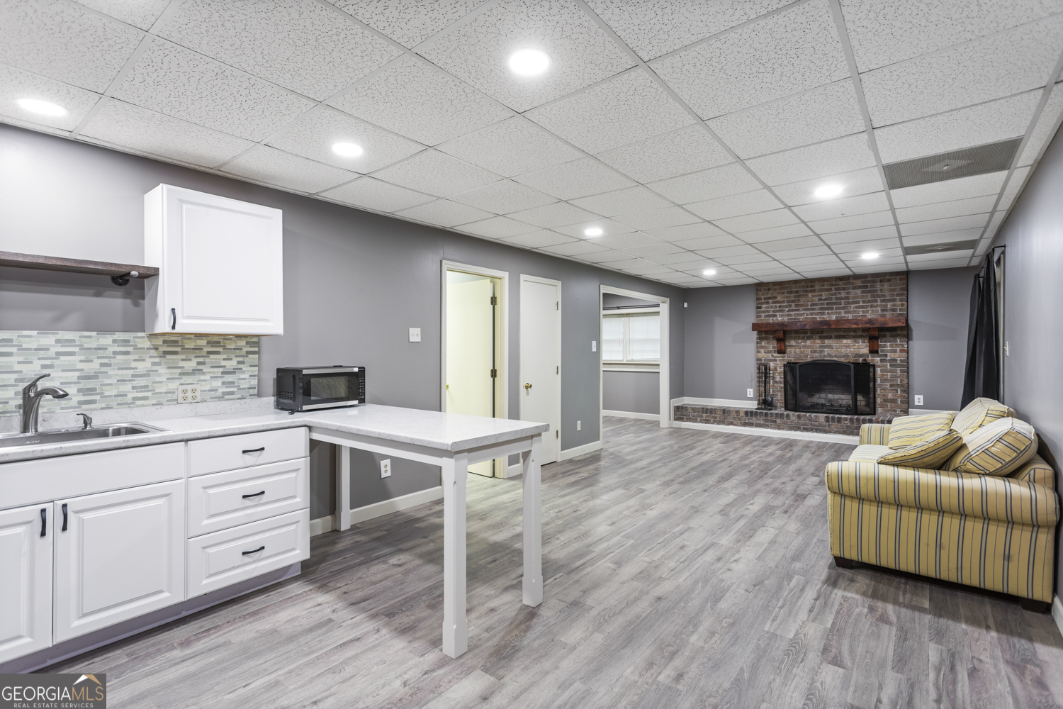 73 Ridgeview Heights Toccoa, GA 30577 - Photo 7 of 67 a living room with furniture and a fireplace