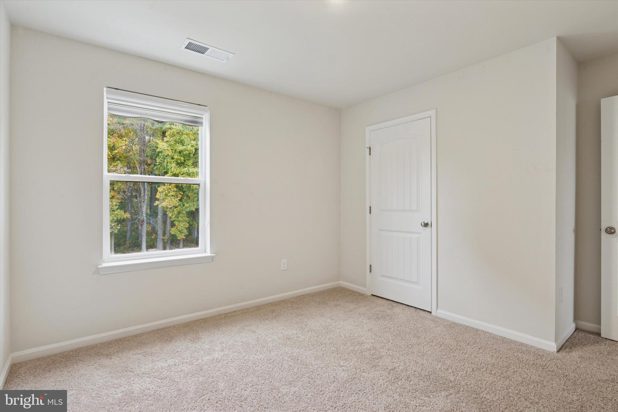 1236 Pimpernell Path Middletown, DE 19709 - Photo 16 of 35 an empty room with a window