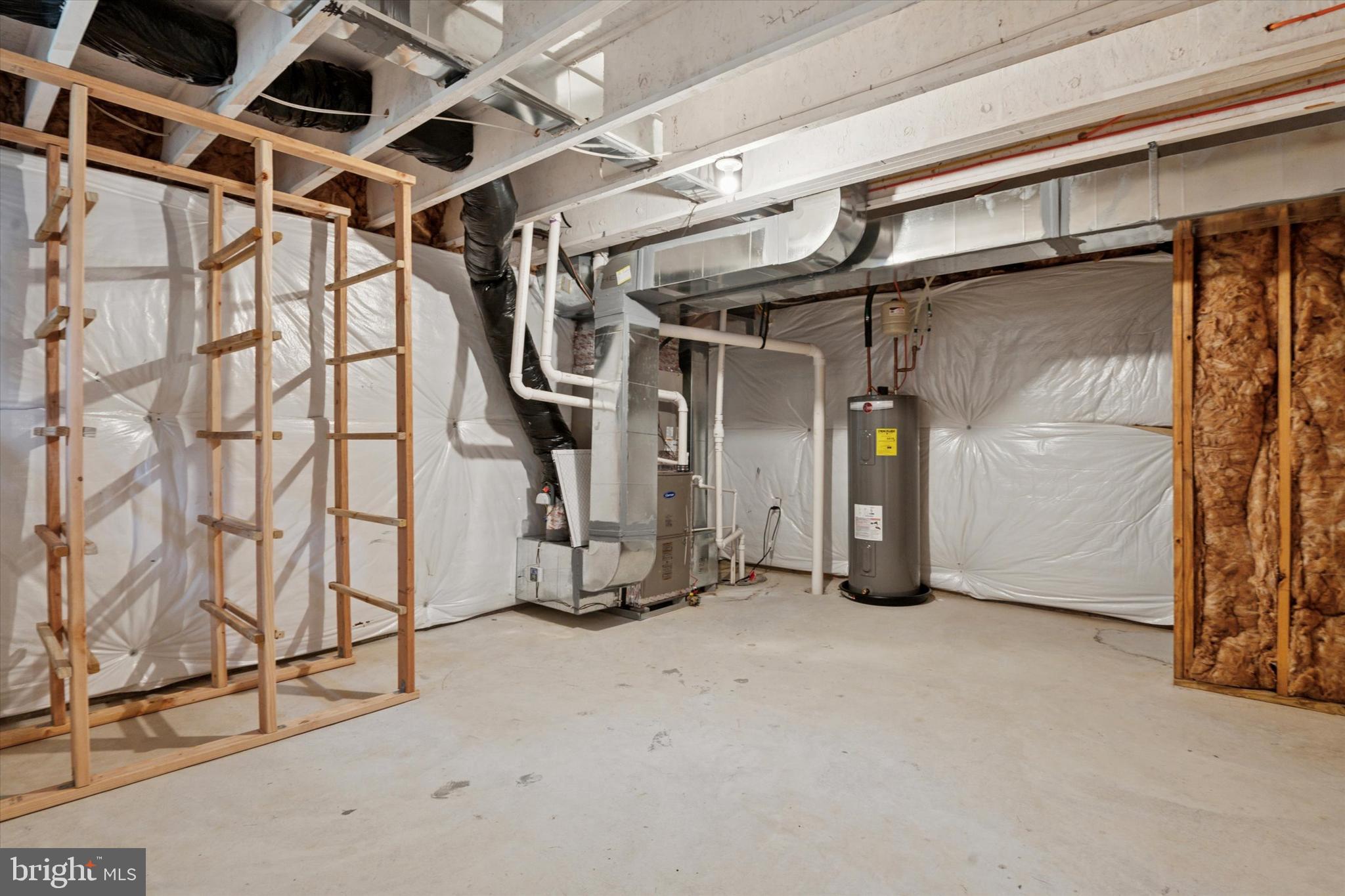 1236 Pimpernell Path Middletown, DE 19709 - Photo 30 of 35 a view of an empty room with wooden walls
