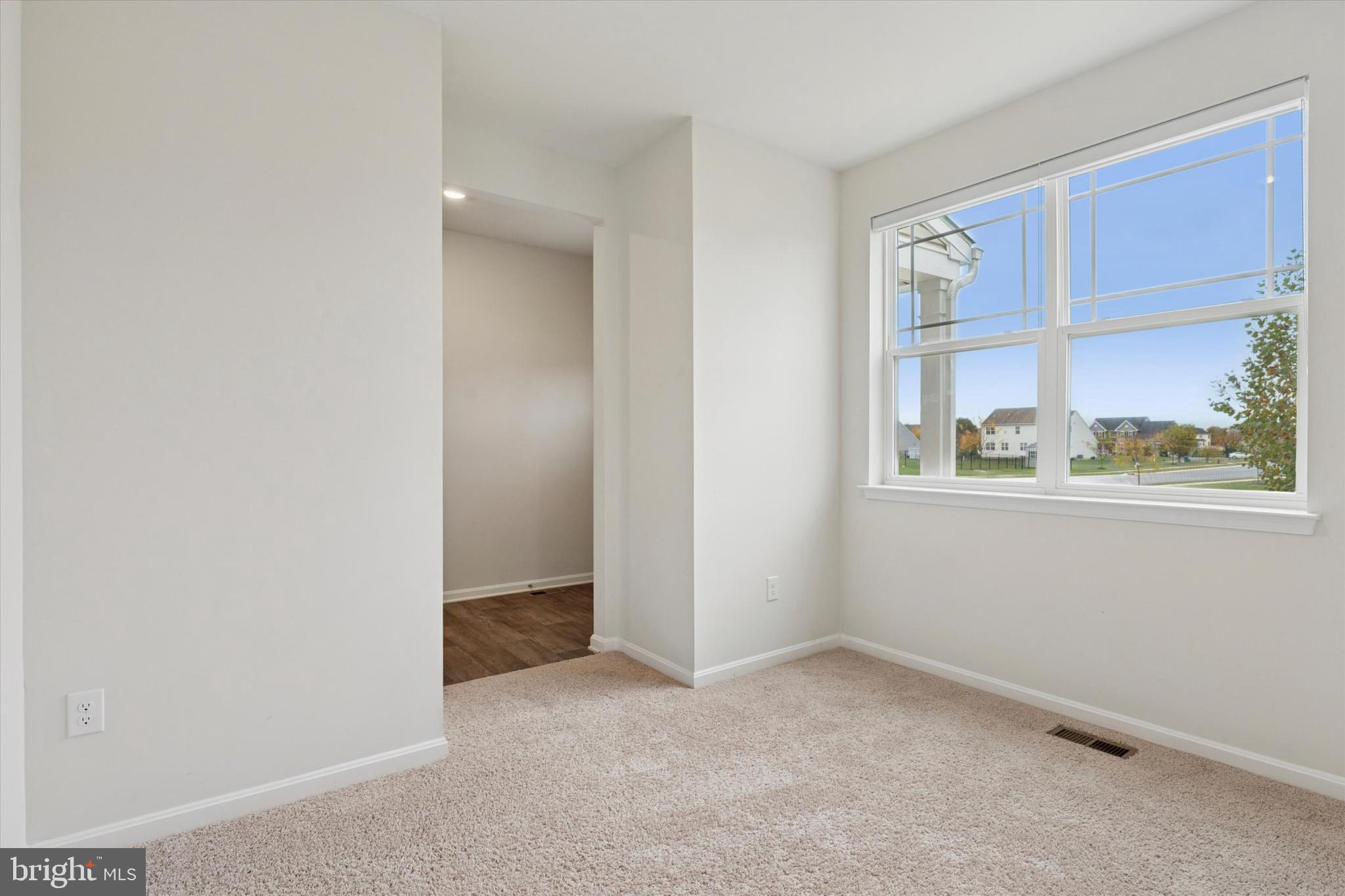 1236 Pimpernell Path Middletown, DE 19709 - Photo 3 of 35 an empty room with a window