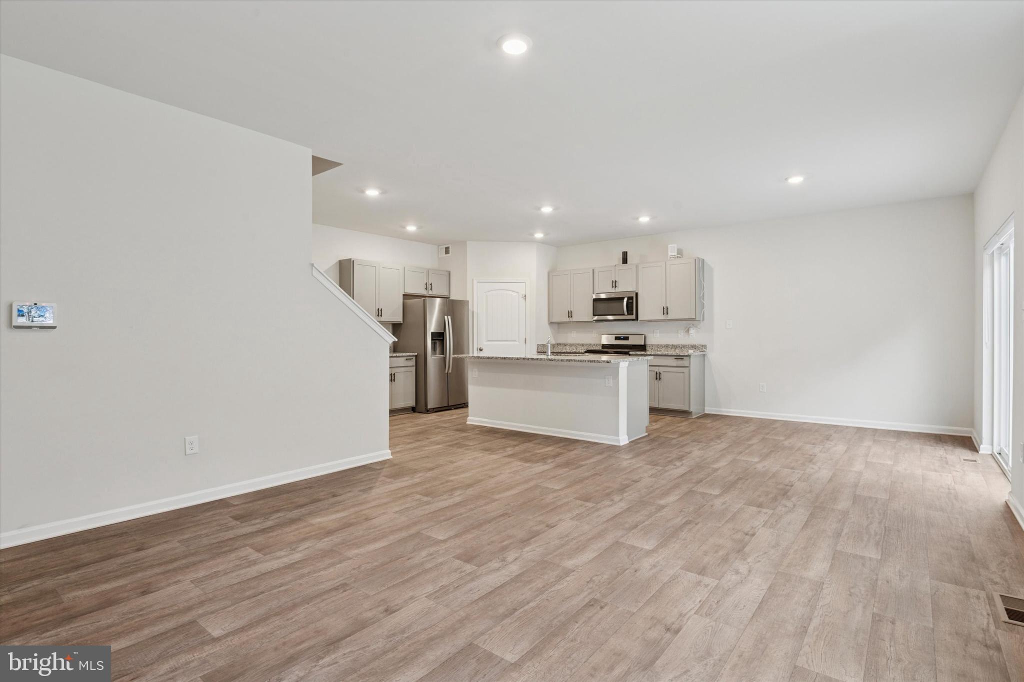 1236 Pimpernell Path Middletown, DE 19709 - Photo 5 of 35 a view of kitchen with wooden floor
