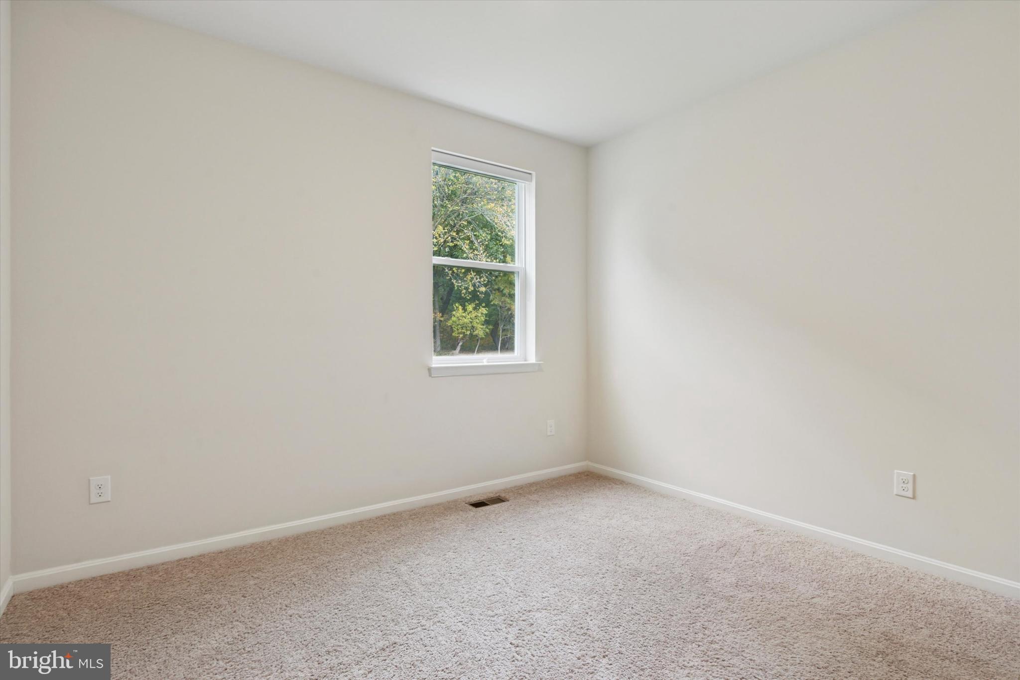 1236 Pimpernell Path Middletown, DE 19709 - Photo 10 of 35 an empty room with a window