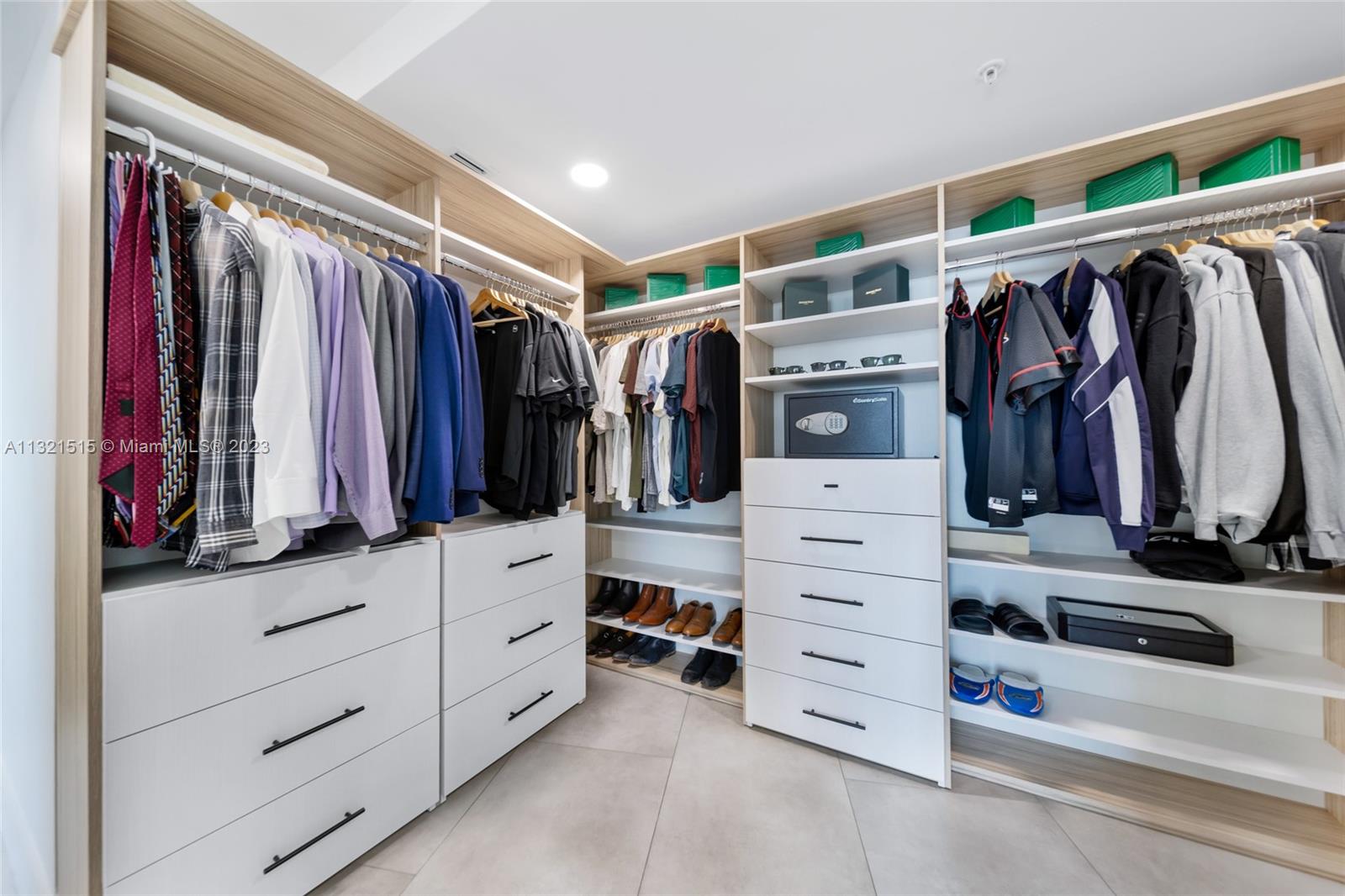 60 Southwest 13th Street, Unit 3600 Miami, FL 33130 - Photo 21 of 43 a view of walk in closet with clothes