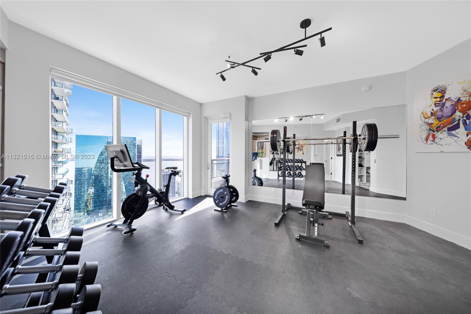 60 Southwest 13th Street, Unit 3600 Miami, FL 33130 - Photo 25 of 43 a view of a room with gym equipment