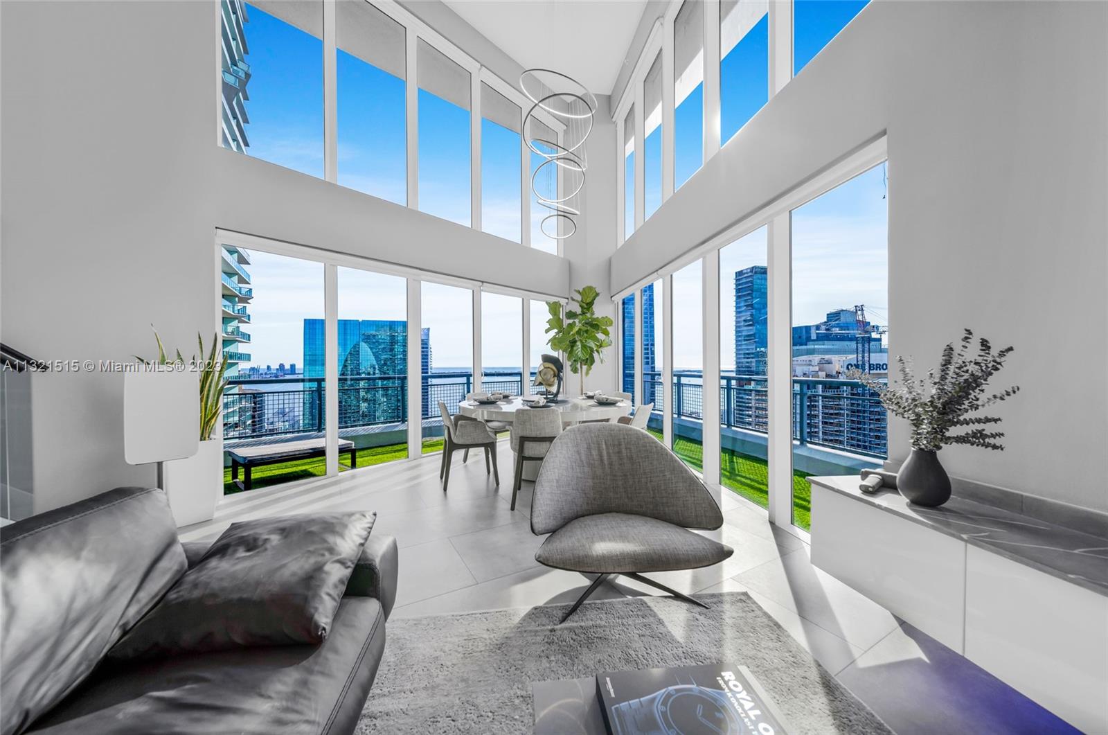 60 Southwest 13th Street, Unit 3600 Miami, FL 33130 - Photo 33 of 43 a living room with furniture and a large window