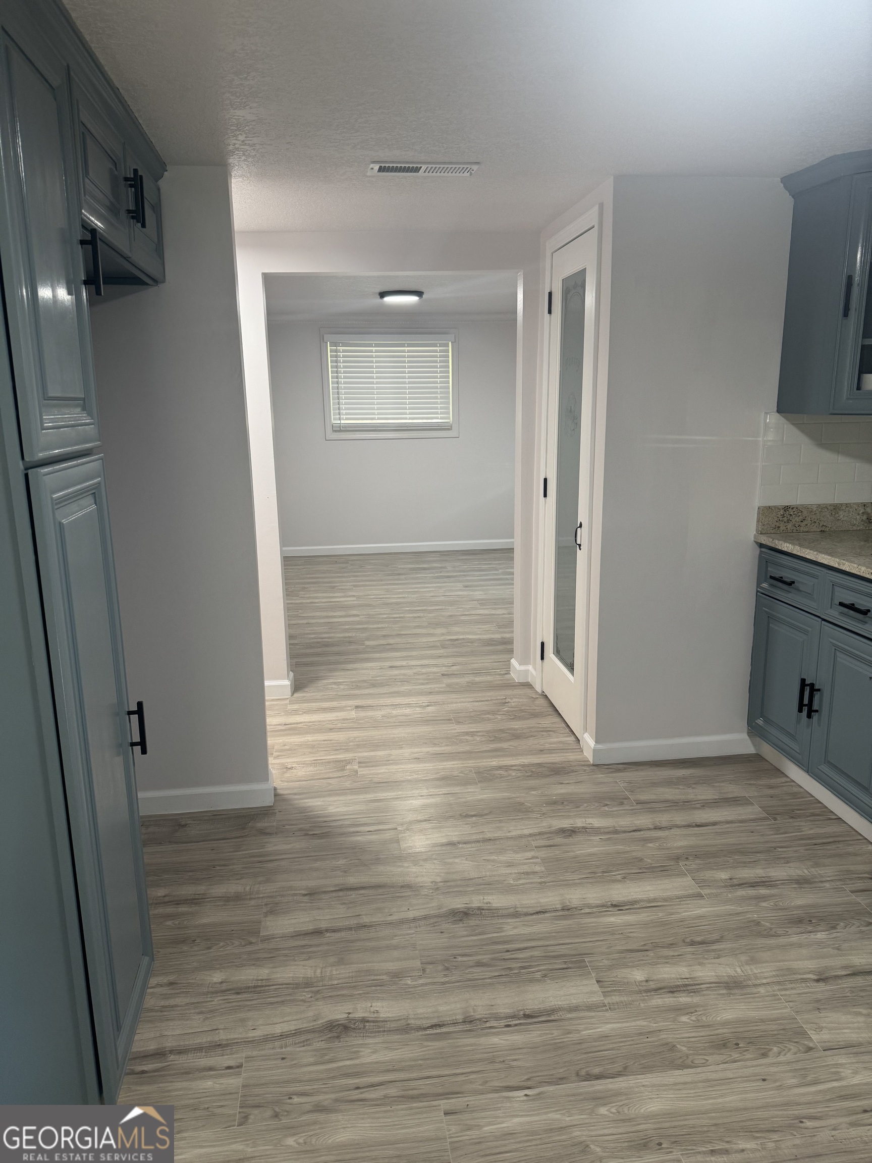 145 Henry Circle LaFayette, GA 30728 - Photo 16 of 28 a view of hallway with wooden floor