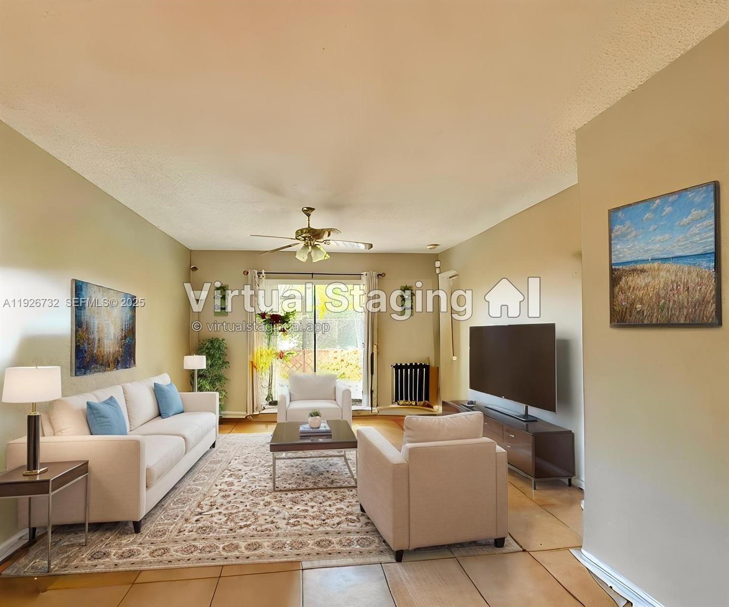 a living room with furniture and a flat screen tv