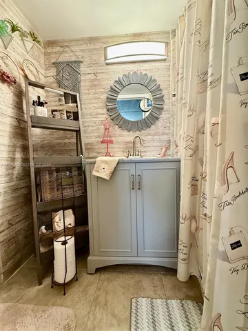 a kitchen with stainless steel appliances granite countertop a sink and a stove