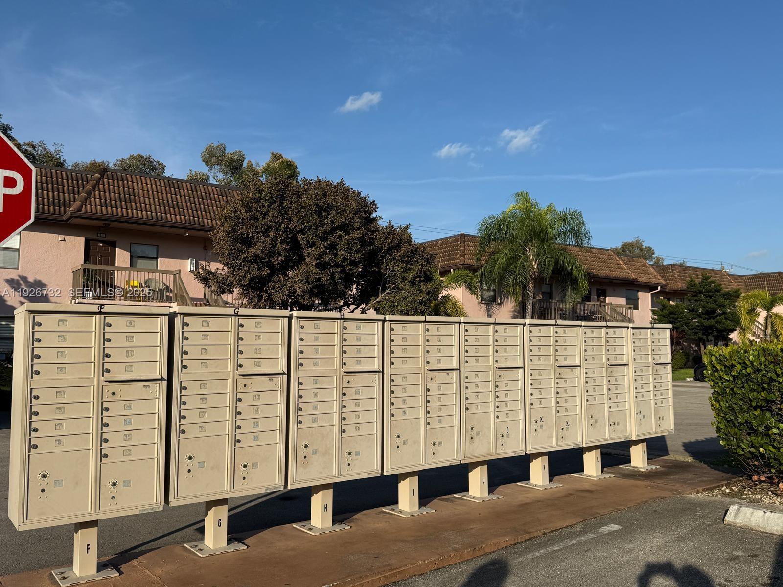 10616 Northwest 10th Street, Unit 104 Pembroke Pines, FL 33026 - Photo 38 of 47 a view of a large building with many windows