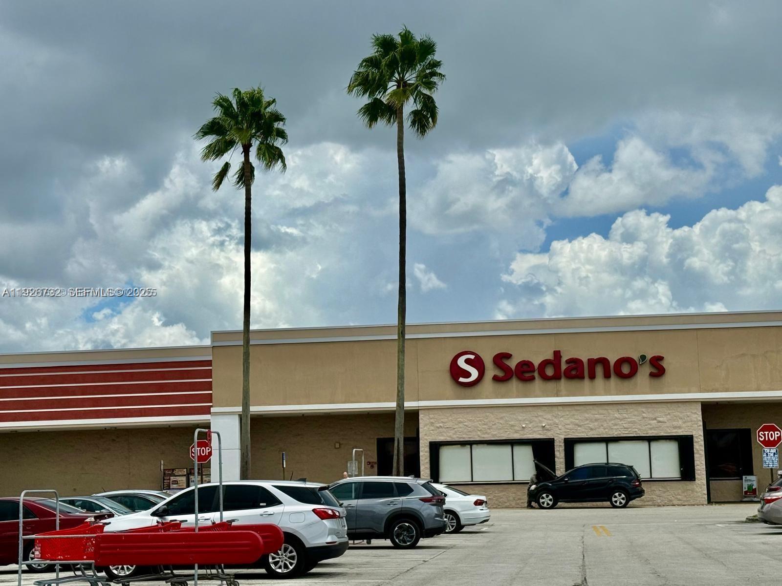 10616 Northwest 10th Street, Unit 104 Pembroke Pines, FL 33026 - Photo 47 of 47 a front view of a building with parking space
