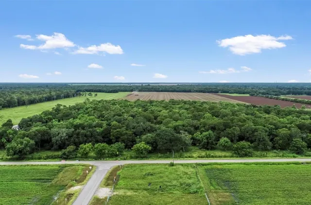 a view of a golf course with a lake