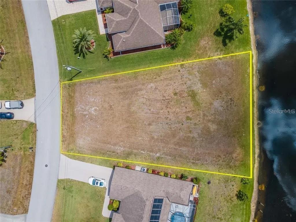 129 Bunker Road Rotonda West, FL 33947 - Photo 6 of 8 an aerial view of a house having outdoor space